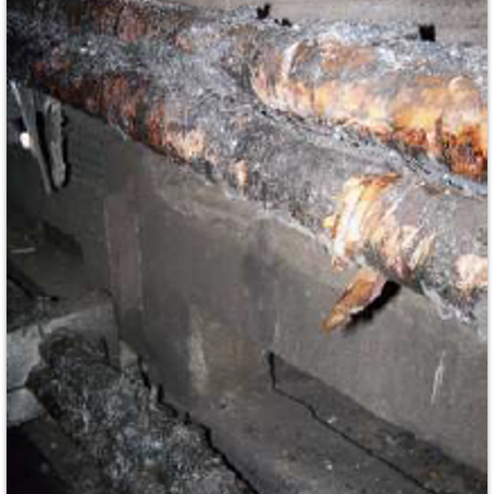 transdist A rotten wall with the roof exposed.